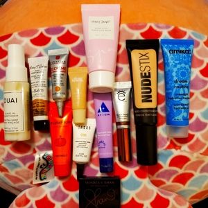 NEW UNUSED MAKEUP, SKINCARE, AND HAIRCARE PLUS A FREE DRAWSTRING BAG.